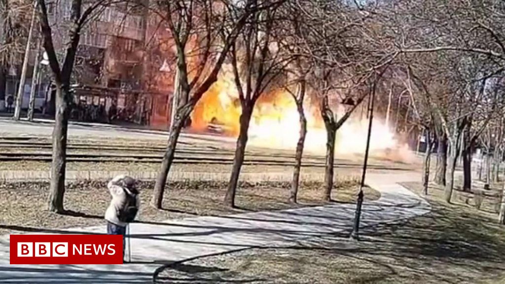 Missile explodes in front of civilian walking in Kyiv