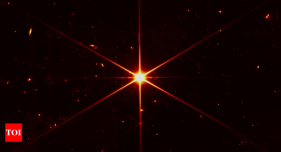 Space telescopes image of star gets photobombed by