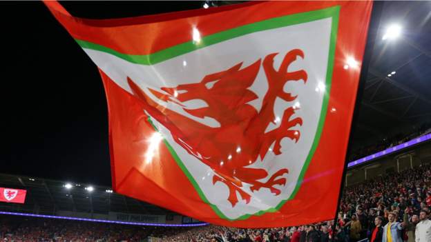 Wales play-off to go ahead in March