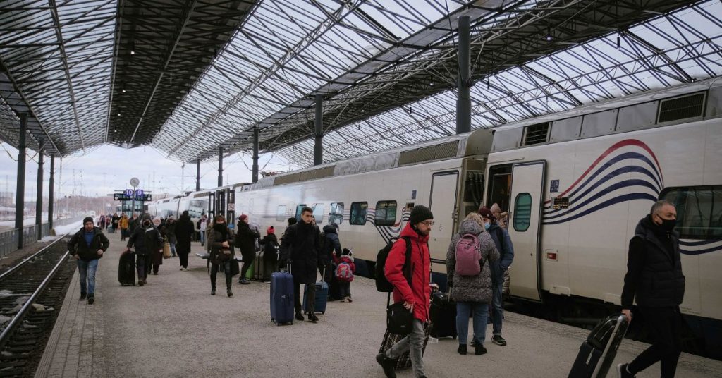 Why Russians Are Fleeing By Train for Europe